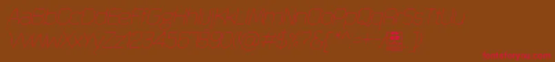 QuizmaThinItalicDemo Font – Red Fonts on Brown Background