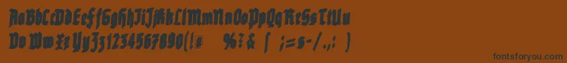 フォントRottenscript – 黒い文字が茶色の背景にあります