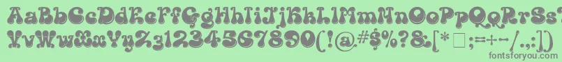 フォントKingthingsLickorishe – 緑の背景に灰色の文字