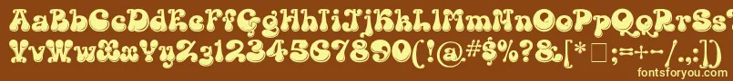 Шрифт KingthingsLickorishe – жёлтые шрифты на коричневом фоне