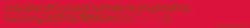 フォントBetad – 赤い背景に茶色の文字