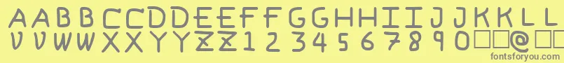 フォントPfVvbf6 – 黄色の背景に灰色の文字