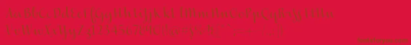 Czcionka Inscreamingcolor – brązowe czcionki na czerwonym tle