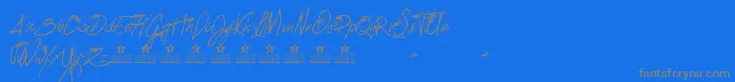 SplattedPersonalUse-Schriftart – Graue Schriften auf blauem Hintergrund