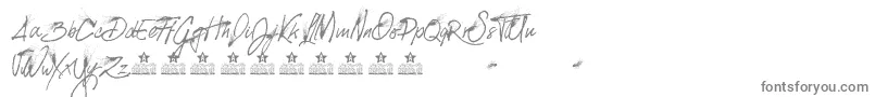 SplattedPersonalUse-Schriftart – Graue Schriften auf weißem Hintergrund