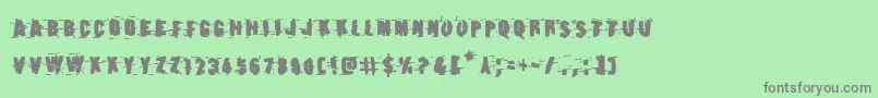 Earthshakebold Font – Gray Fonts on Green Background