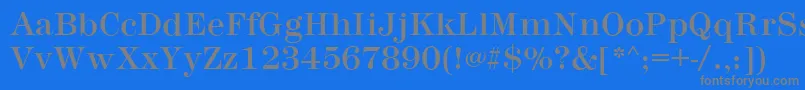 フォントMontpellierRegular – 青い背景に灰色の文字