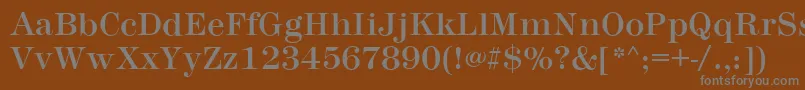 MontpellierRegular-fontti – harmaat kirjasimet ruskealla taustalla