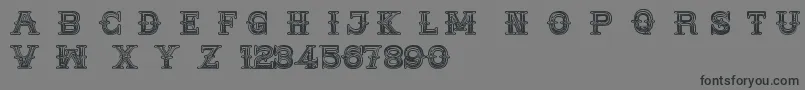 MedicineShowCaps Font – Black Fonts on Gray Background