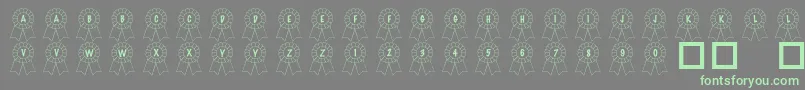 Więcej informacji o czcionce 101AwardsWon Czcionka 101AwardsWon – zielone czcionki na szarym tle