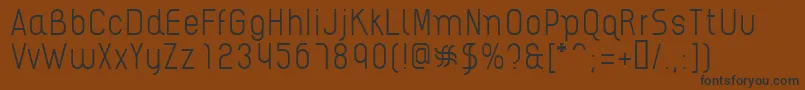 AikelsoL Font – Black Fonts on Brown Background