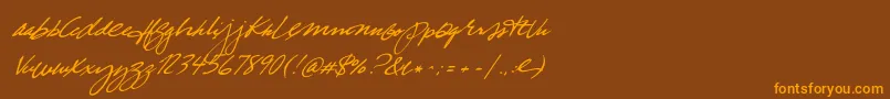 フォントTrueBlue – オレンジ色の文字が茶色の背景にあります。