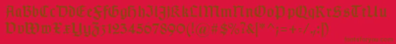 Fonte Typographergotischaunz1 – fontes marrons em um fundo vermelho