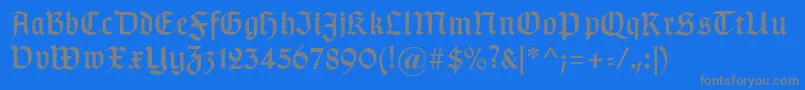 Typographergotischaunz1 Font – Gray Fonts on Blue Background