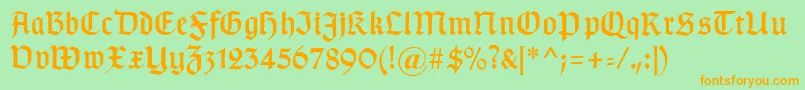 Typographergotischaunz1-Schriftart – Orangefarbene Schriften auf grünem Hintergrund