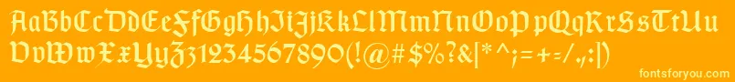 Fonte Typographergotischaunz1 – fontes amarelas em um fundo laranja