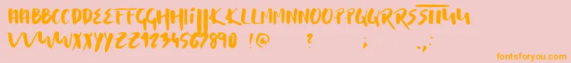 フォントMusterion – オレンジの文字がピンクの背景にあります。