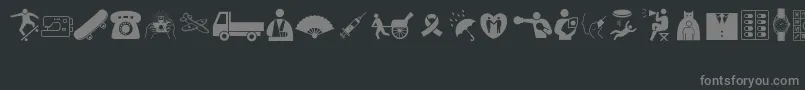 Fonte WoodcutterMixedIconsVol1 – fontes cinzas em um fundo preto