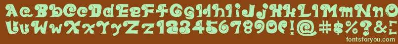 Eyefont-fontti – vihreät fontit ruskealla taustalla
