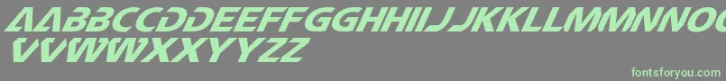 CftechnomaniaSlanted Font – Green Fonts on Gray Background