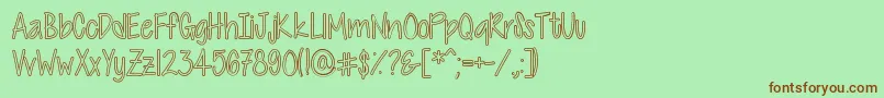 CutiePatootieHollow Font – Brown Fonts on Green Background