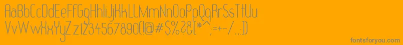 Redhg-Schriftart – Graue Schriften auf orangefarbenem Hintergrund