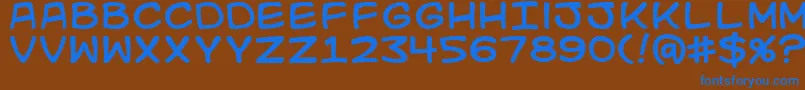 Kidkosmic Font – Blue Fonts on Brown Background