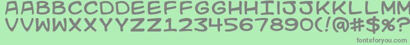 Kidkosmic Font – Gray Fonts on Green Background