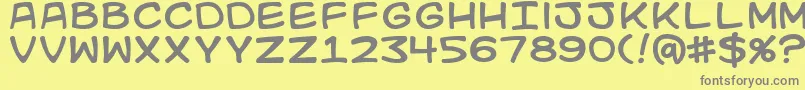 Kidkosmic Font – Gray Fonts on Yellow Background