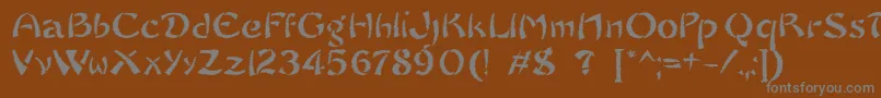 フォントSayonaraTrashFree – 茶色の背景に灰色の文字