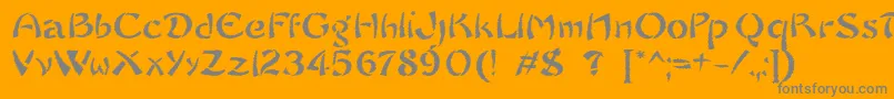 Czcionka SayonaraTrashFree – szare czcionki na pomarańczowym tle