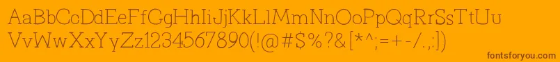 PrimitivaLight Font – Brown Fonts on Orange Background