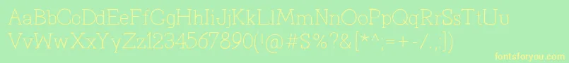 フォントPrimitivaLight – 黄色の文字が緑の背景にあります