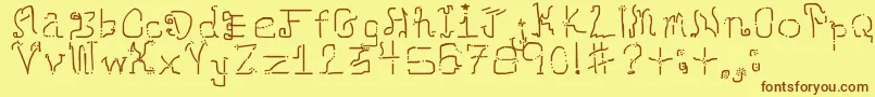 フォントNeomarkerism – 茶色の文字が黄色の背景にあります。