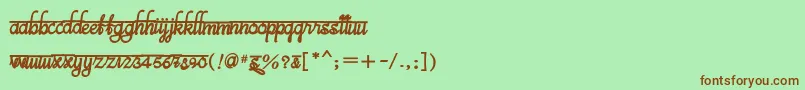 フォントBitsindiancalligraBold – 緑の背景に茶色のフォント