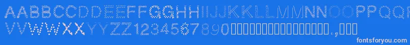 Pwpatchwork Font – Pink Fonts on Blue Background