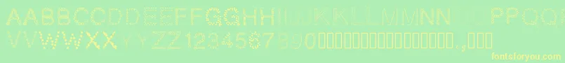Pwpatchwork Font – Yellow Fonts on Green Background