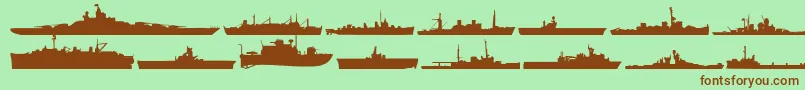 Usnavy-Schriftart – Braune Schriften auf grünem Hintergrund