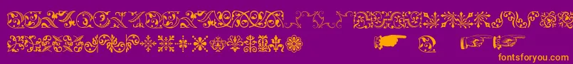 Baroqueornaments-fontti – oranssit fontit violetilla taustalla