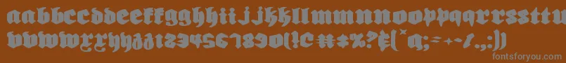 Biergartene-Schriftart – Graue Schriften auf braunem Hintergrund