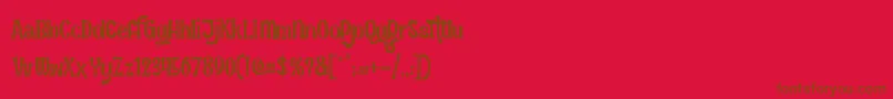 FunInTheJungle-Schriftart – Braune Schriften auf rotem Hintergrund