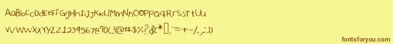 フォントSharonhandwriting – 茶色の文字が黄色の背景にあります。