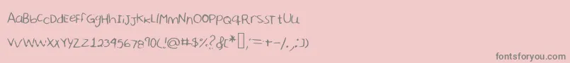 Sharonhandwriting-fontti – harmaat kirjasimet vaaleanpunaisella taustalla