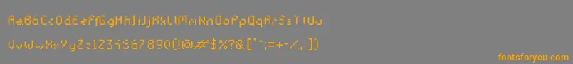 フォントGalacticasRegular – オレンジの文字は灰色の背景にあります。