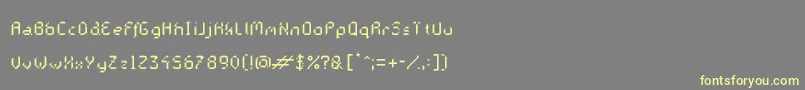 フォントGalacticasRegular – 黄色のフォント、灰色の背景