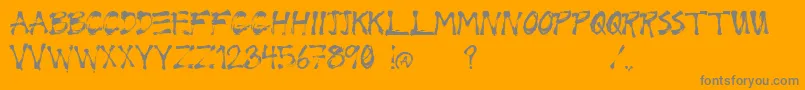 Wrix-fontti – harmaat kirjasimet oranssilla taustalla