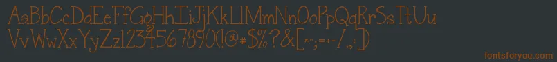 Jandasnickerdoodleserif Font – Brown Fonts on Black Background