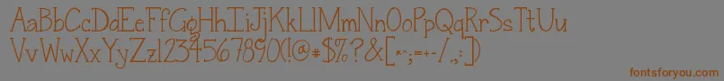 Jandasnickerdoodleserif Font – Brown Fonts on Gray Background
