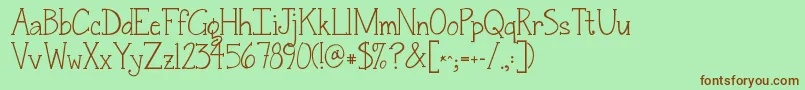 Fonte Jandasnickerdoodleserif – fontes marrons em um fundo verde