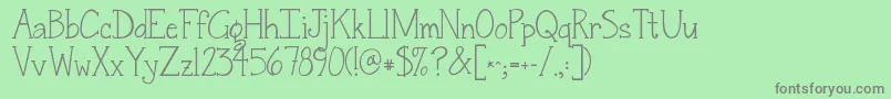 Fonte Jandasnickerdoodleserif – fontes cinzas em um fundo verde